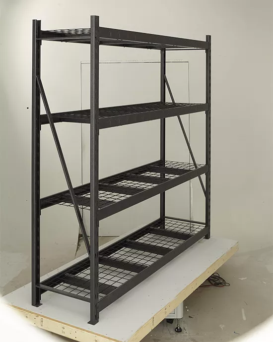 Clipping Path service for a tall black metal shelving unit with five wire mesh shelves, standing on a wooden platform.