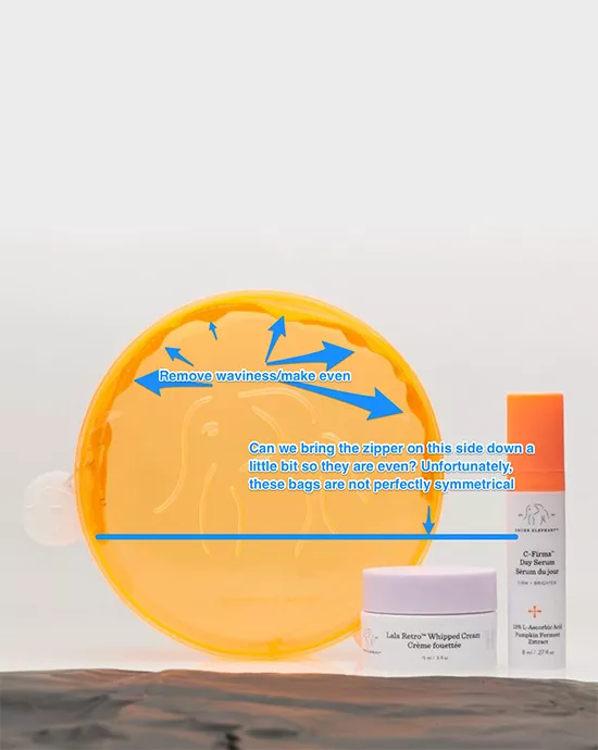 Transparent circular cosmetic bag with skincare products and design adjustment notes – Ecommerce photo editing services.