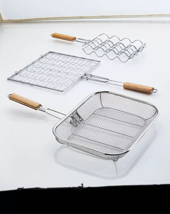 Clipping Path service for various metal cooking grids and a frying basket with wooden handles.