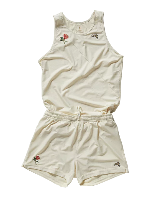 Light beige tank top and matching shorts with decorative floral and bird embroidery.