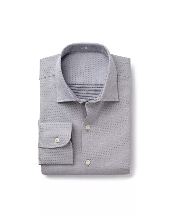 7_After Folded light gray shirt with subtle polka dots, button-up collar, and single-button cuff.