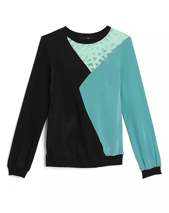 Long-sleeved sweatshirt with an asymmetrical black and teal design, displayed on a white background.