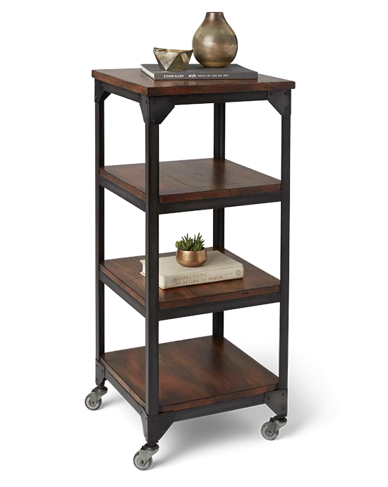 A four-tiered rolling cart made of dark wood and metal, with decorative items on the shelves.