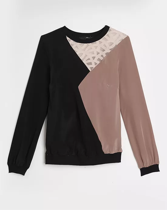 A color-blocked sweatshirt with beige, black, and patterned segments on a white background.